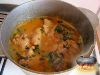 Фото к рецепту: Курица тушеная в томатно-грибном соусе